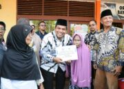 Suhatri Bur Lounching Penyerahan Bantuan Sosial Tunai (BST) Mitigasi Resiko Pangan (MRP) tahap 1 Tahun 2024.