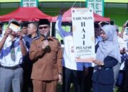 Wawako Ibnu Asis Hadiri Pembukaan Dan Penyerahan Buku Tabungan Haji Pelajar
