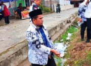 HUT PGRI yang ke- 80 Wabup Solok H. Candra Gelar Aksi Bersihkan Sampah Bersama